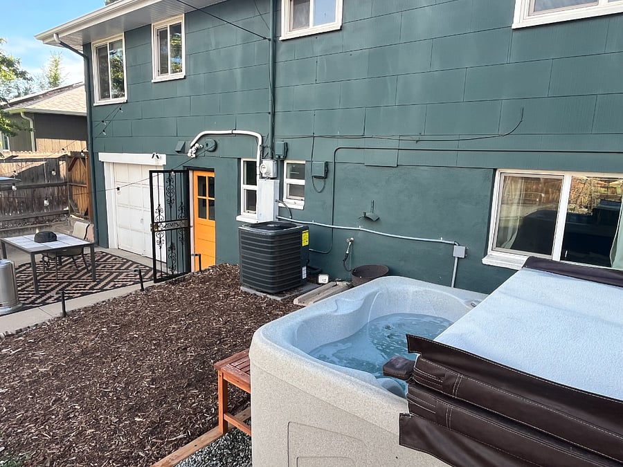 4-person hot tub in back yard