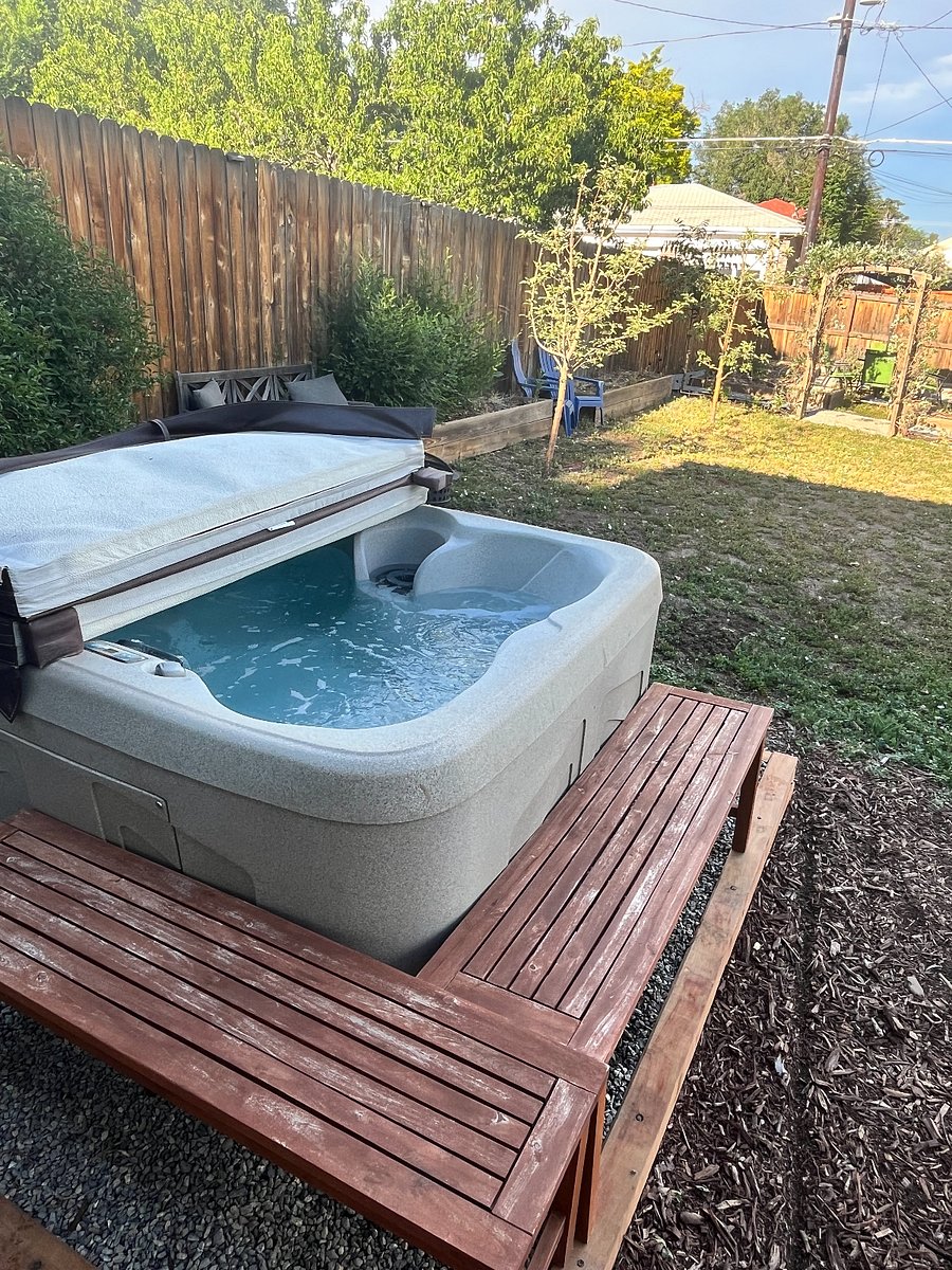 4-person hot tub in back yard