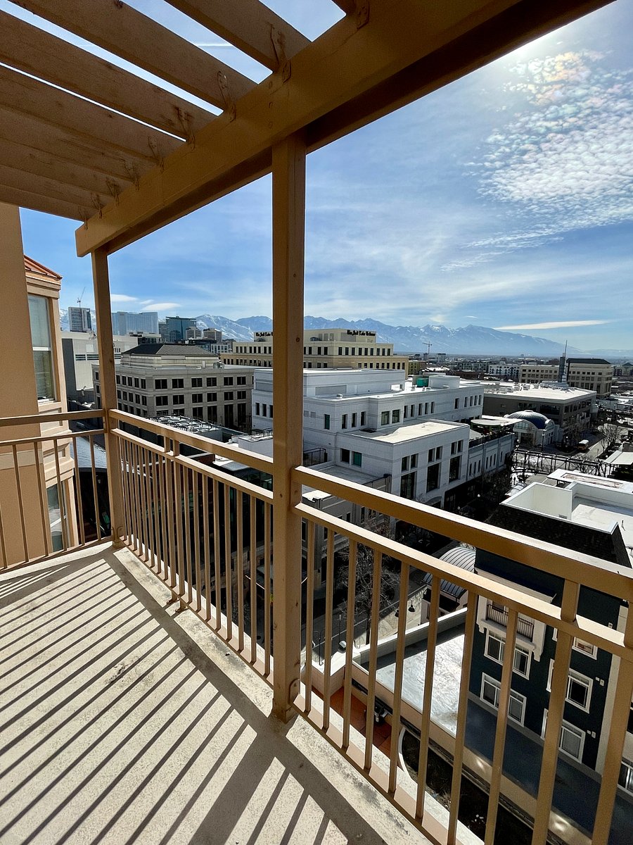 From top floor pergola balcony, looking East and South; outdoor chairs and table provided