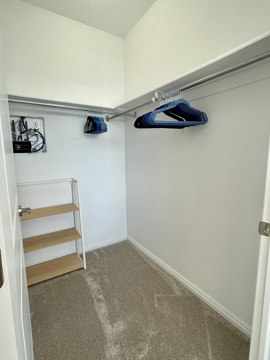 Walk-in closet in bedroom