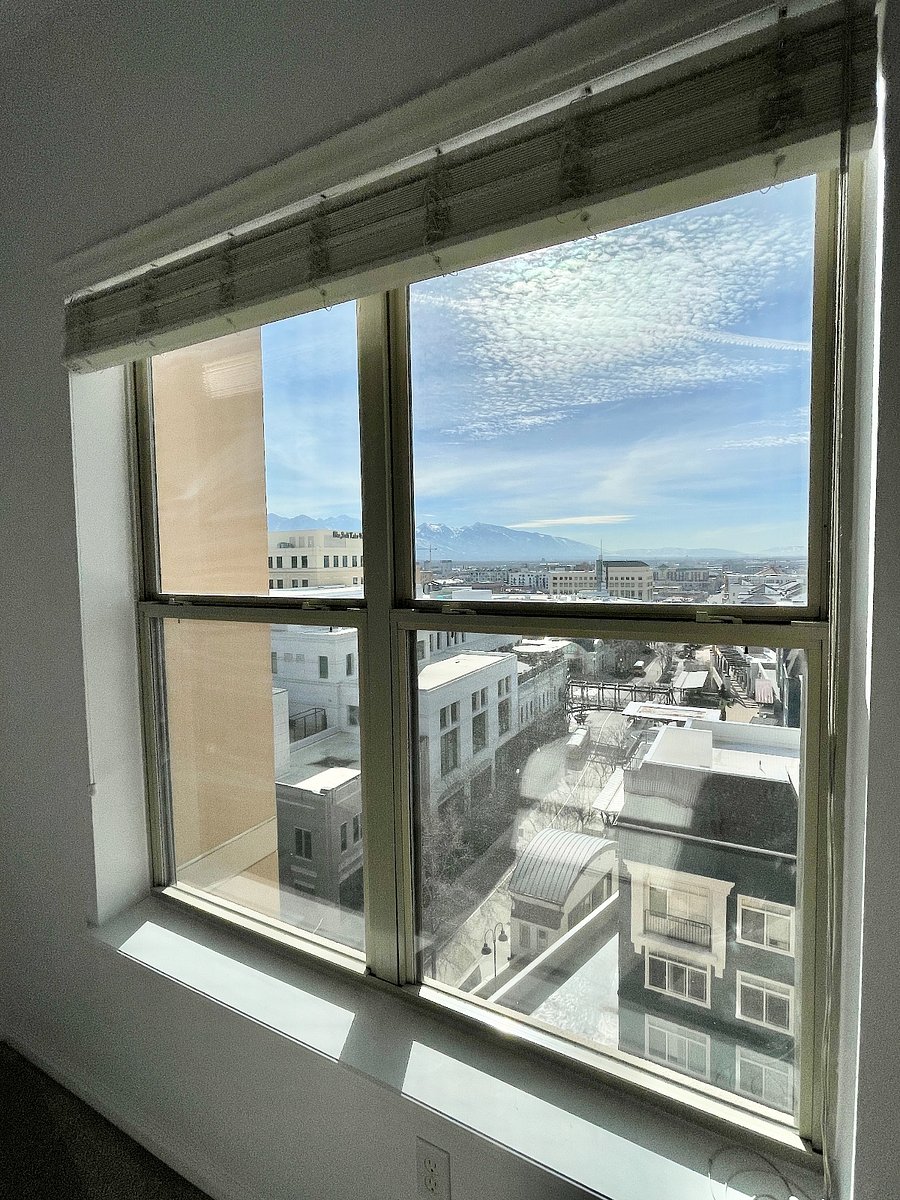 Huge bedroom window with view of Salt Lake Valley