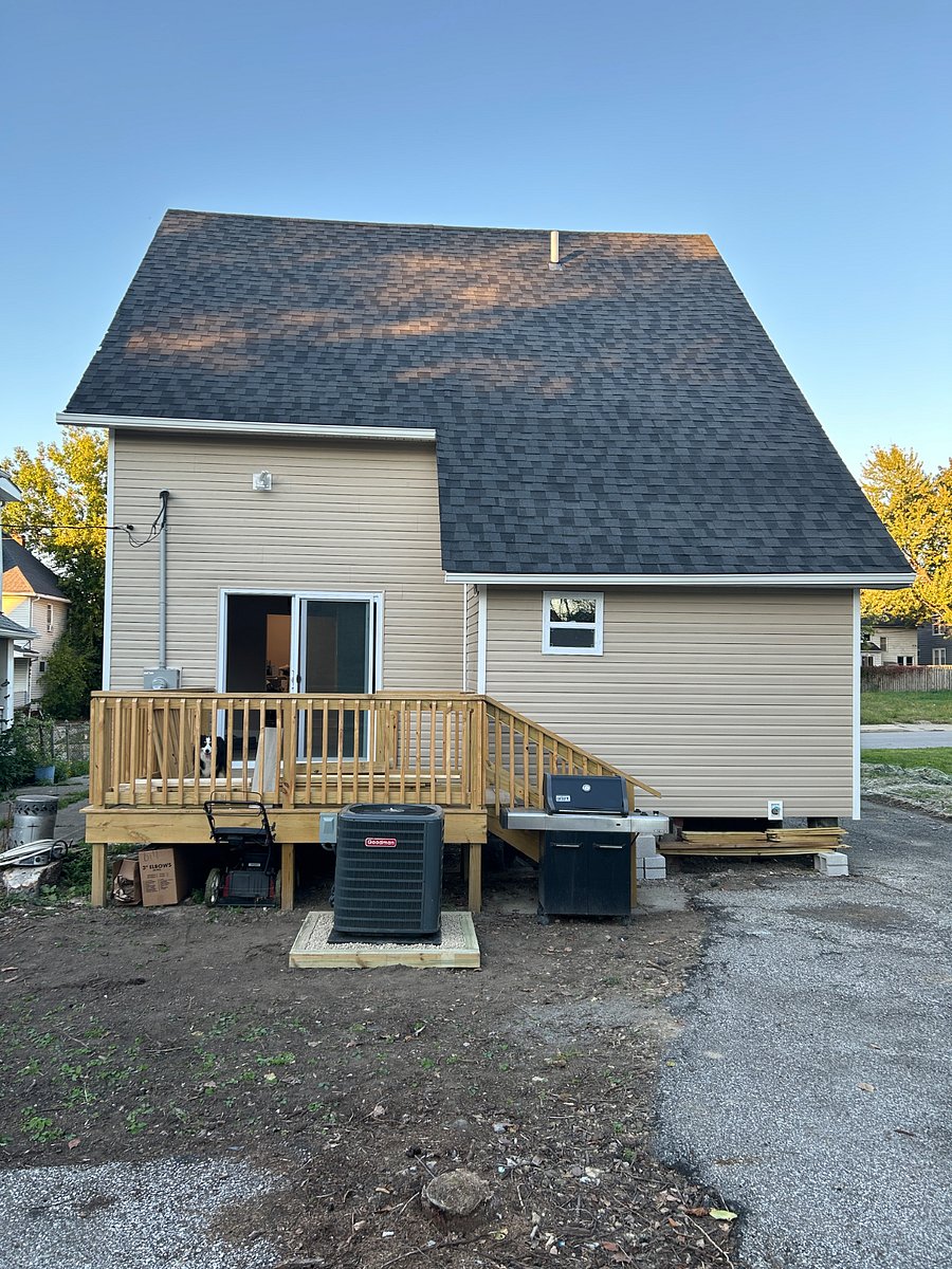 Rear patio area, grill, dog not included.