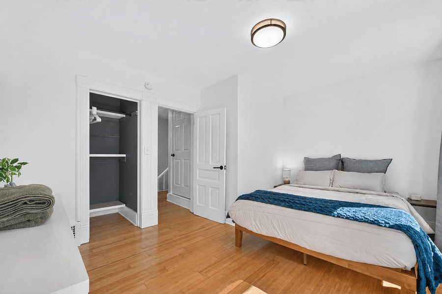 Second bedroom, queen bed, blackout curtains, sound machine, and closet