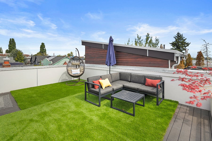 roof deck with sofa, egg chair