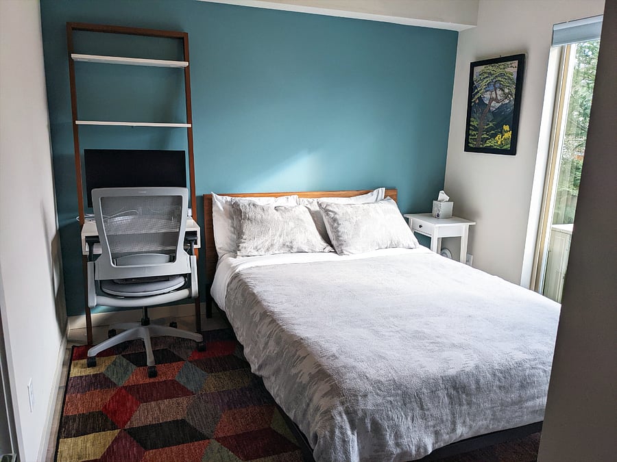 Front bedroom with desk and 24" monitor
