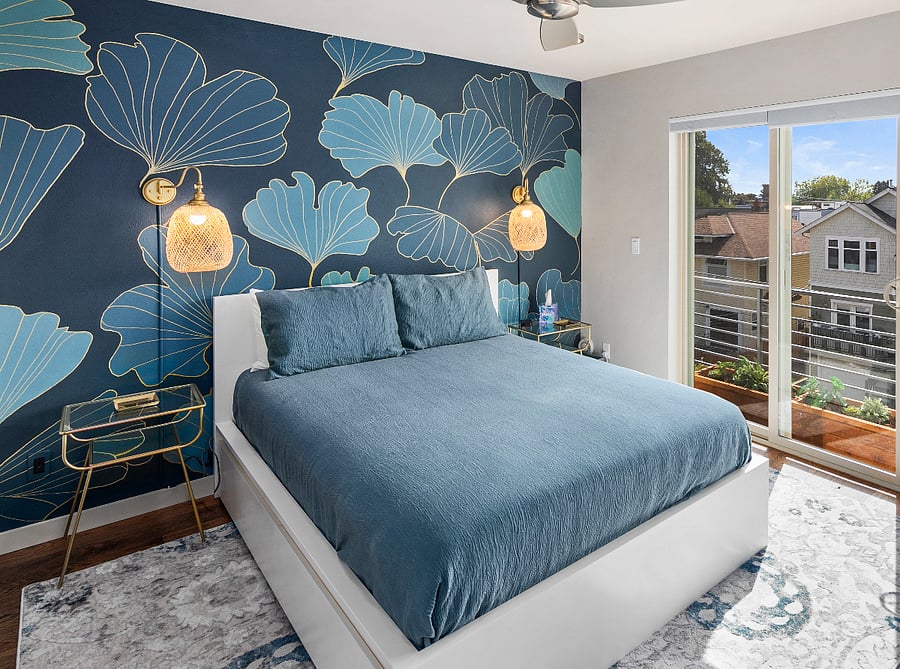 Primary bedroom with balcony