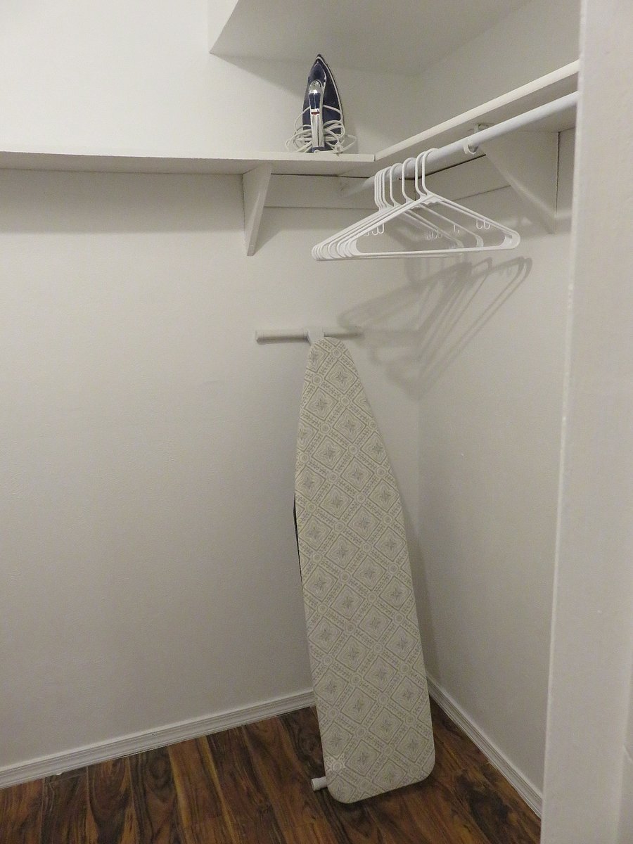 Walk in closet with Ironing Board