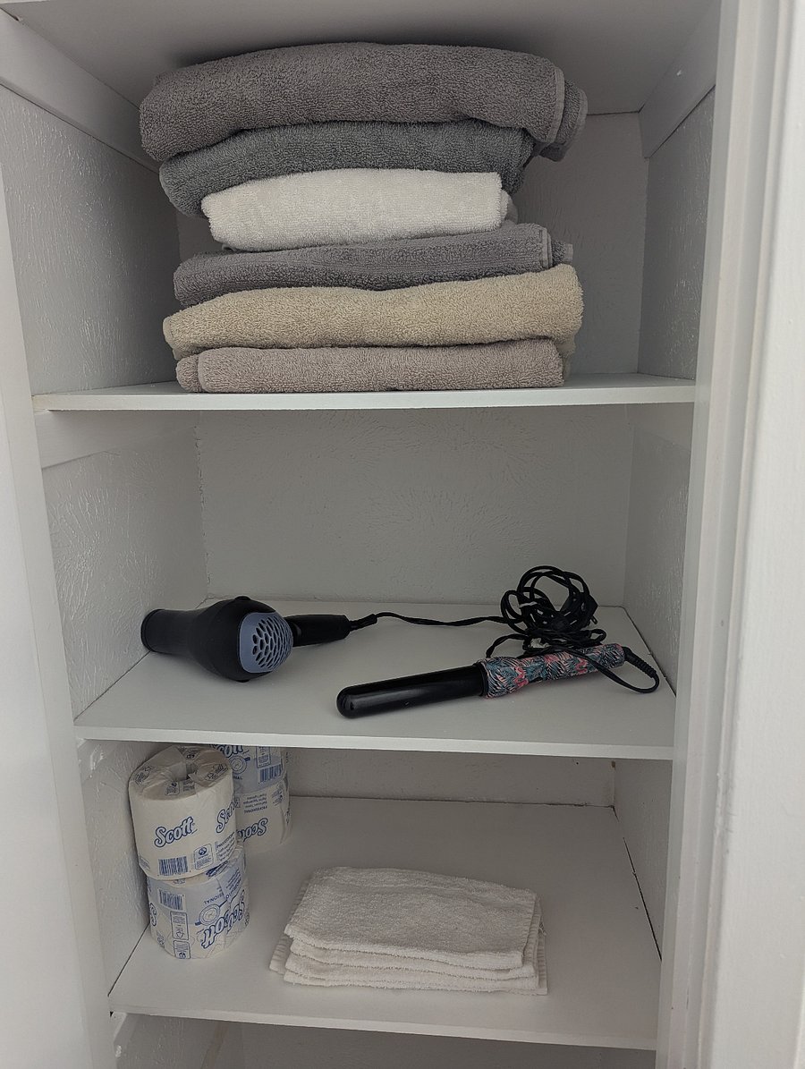 Guest bathroom towel closet