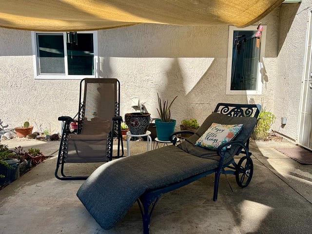 Private entrance to room opens onto fenced backyard patio