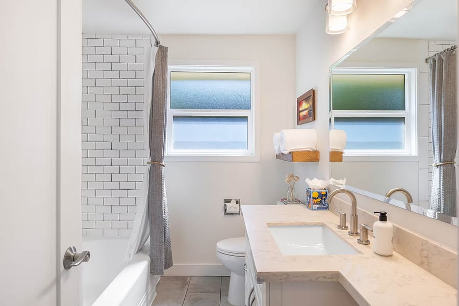 Main floor full bathroom with 80 year old cast iron tub.