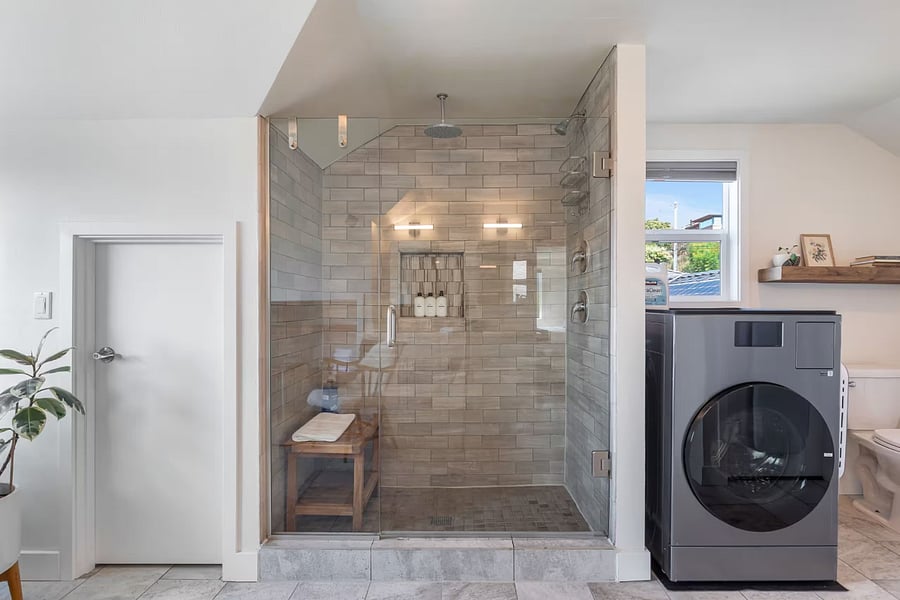 Rainfall double headed shower and a washer/dryer combination in the upstairs master bathroom.