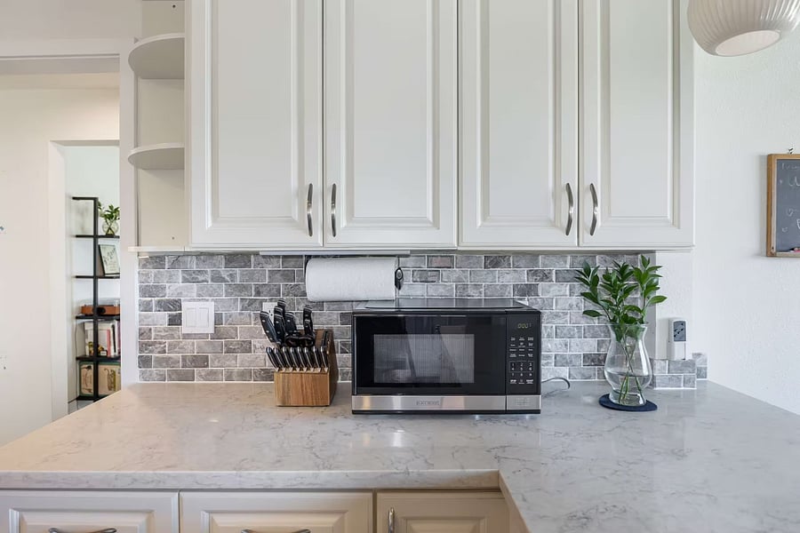 Microwave on the spacious kitchen counter.