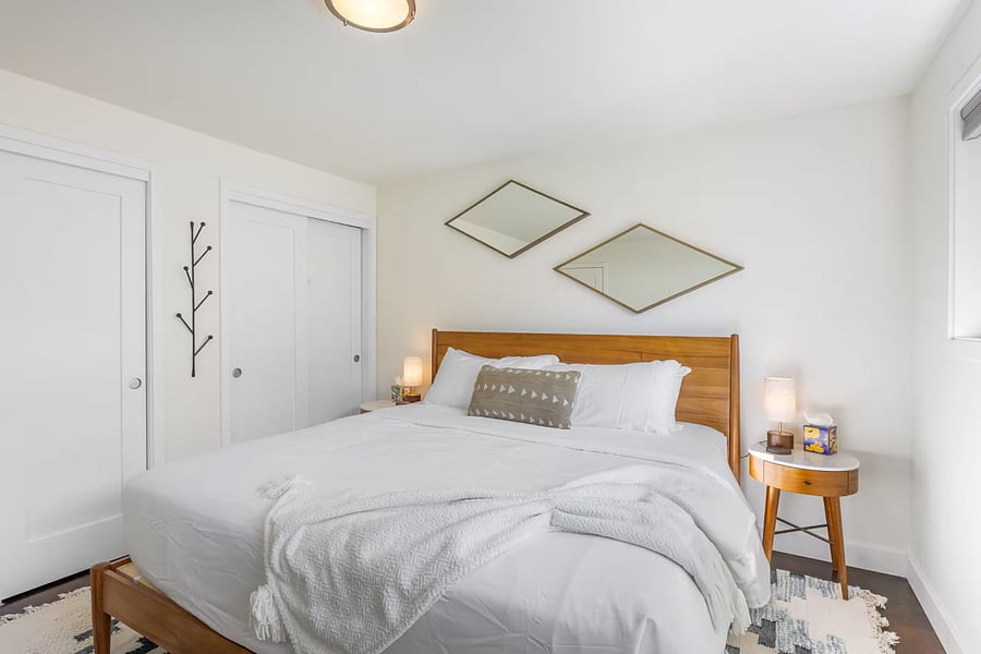 Main floor bedroom #1. Bedside tables have charging ports.