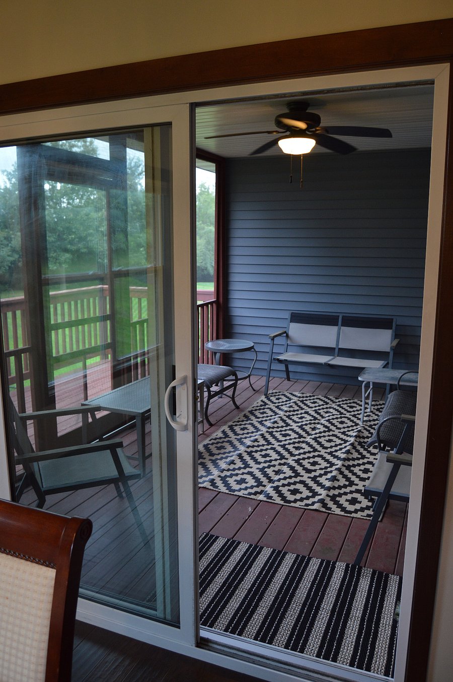 screened in porch off of upstairs dining room/kitchen