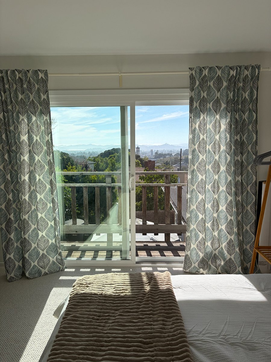 Daytime views of Marin and Mount Tam with wrap around balcony