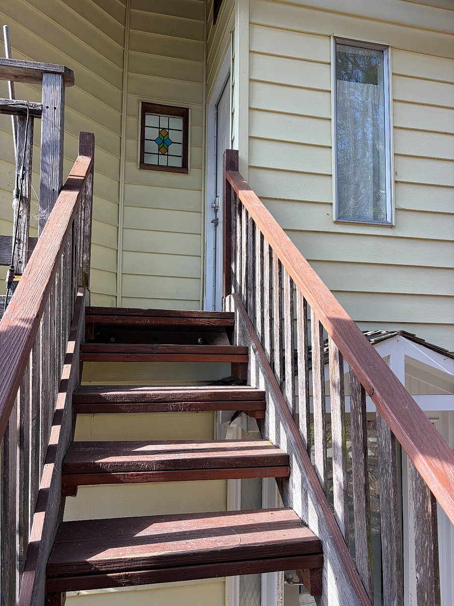 Stairs up to the studio entrance, wrap around balcony