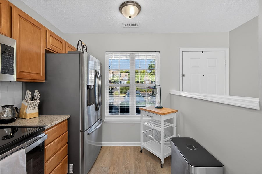 Kitchen with new, large refrigerator
