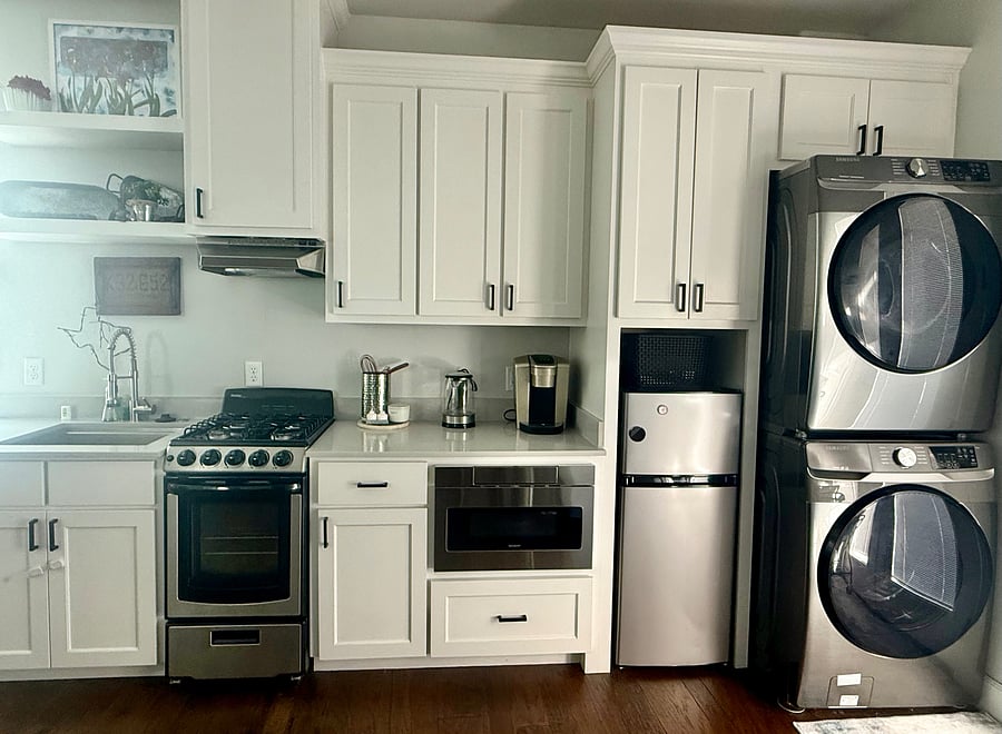 Full-size laundry with efficiency fridge, stove and dishwasher. Full-size drawer microwave.