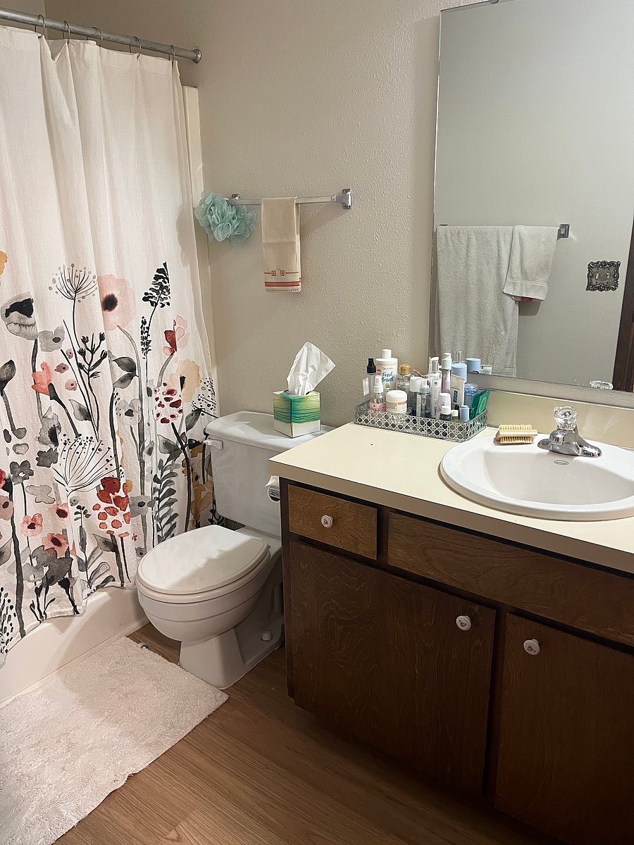 Upstairs bathroom with bath and overhead shower