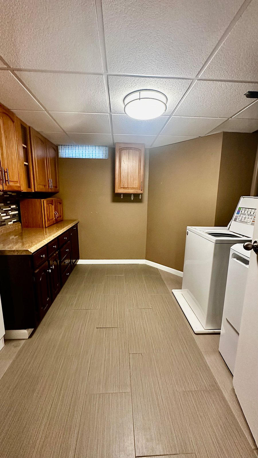 Laundry room in basement