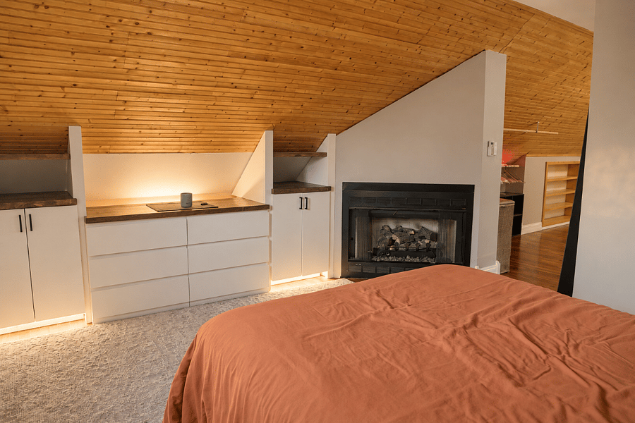Private Bedroom with Built-in Dresser and fireplace