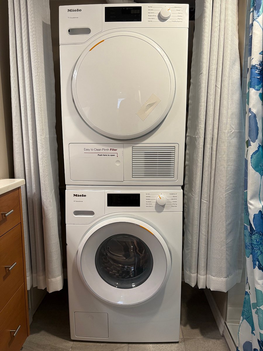 In-unit washer/dryer, featuring Miele appliances