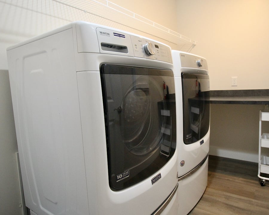 full size washer and dryer in upstairs laundry room