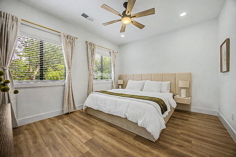 Second guest bedroom on 2nd floor with a king bed and attached with the Jack and Jill bathroom. Has it's own walk in closet