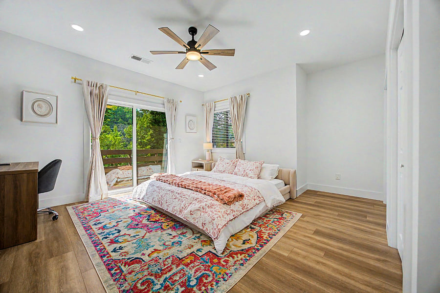 Main bedroom with King bed on 2nd floor. Walk in closet, desk setup and a huge bathroom.