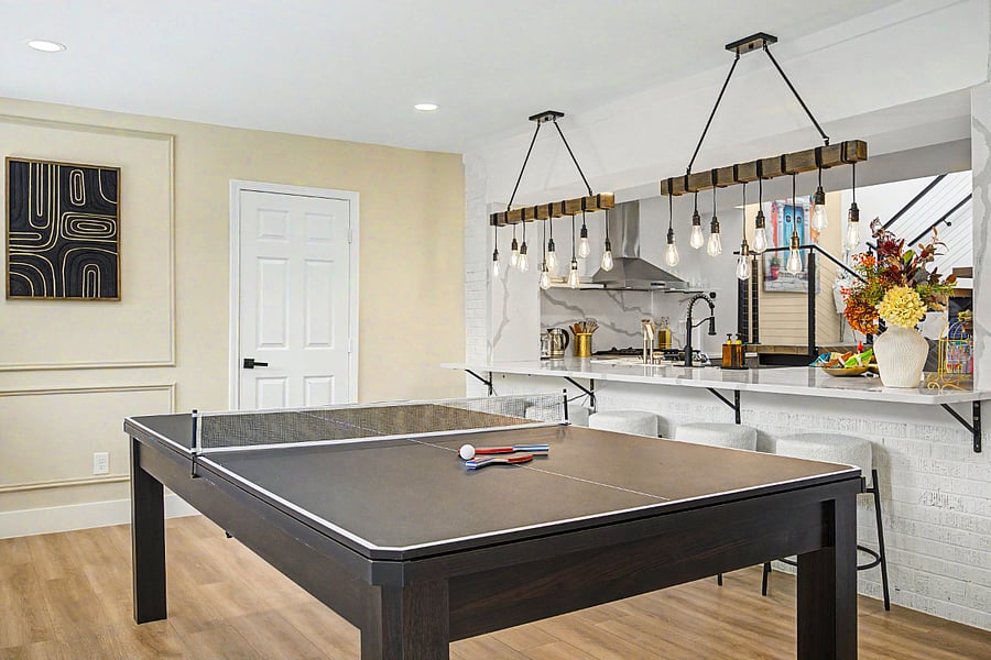 3 in 1 dining table that easily sits 8 people and can convert into a full size ping pong table and a pool table