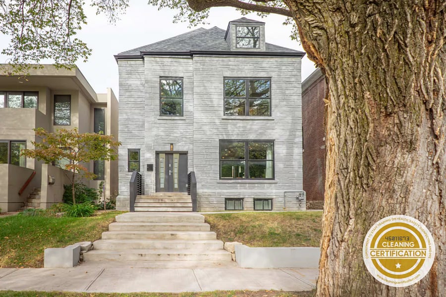 Grey leather chairs and a glass coffee table greet you near the front entry.