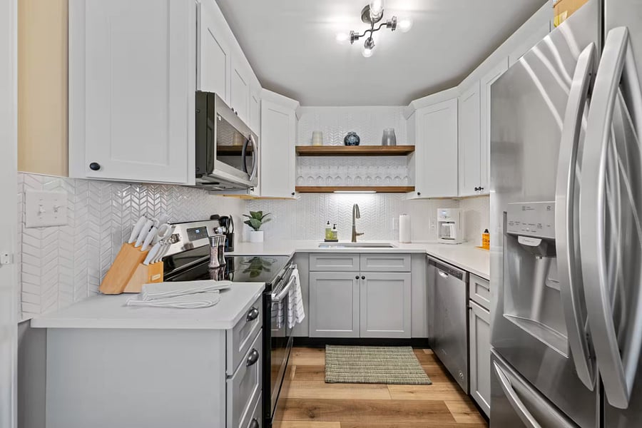 A bright bedroom offers a large closet and convenient access to an en-suite bath.