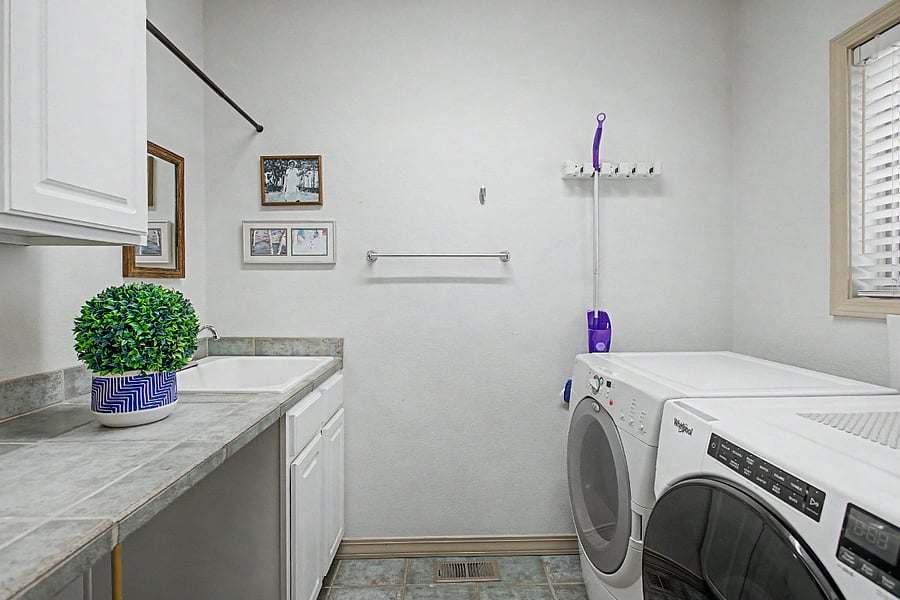 Laundry Room w full sized washer and dryer