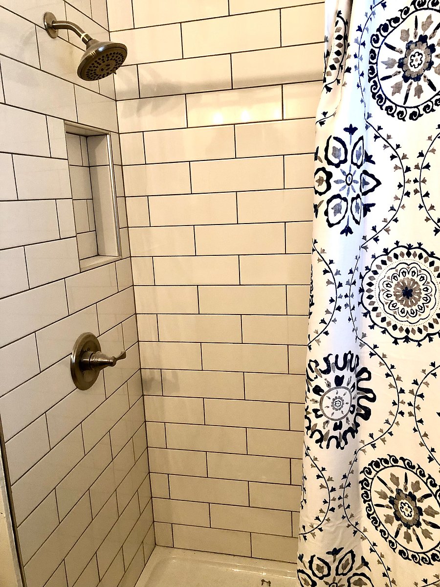 Bathroom has shower and closet.
