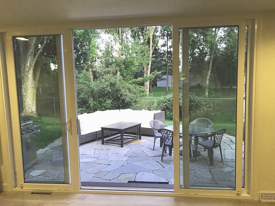 Floor-to-ceiling windows offer spectacular views the park from the family room