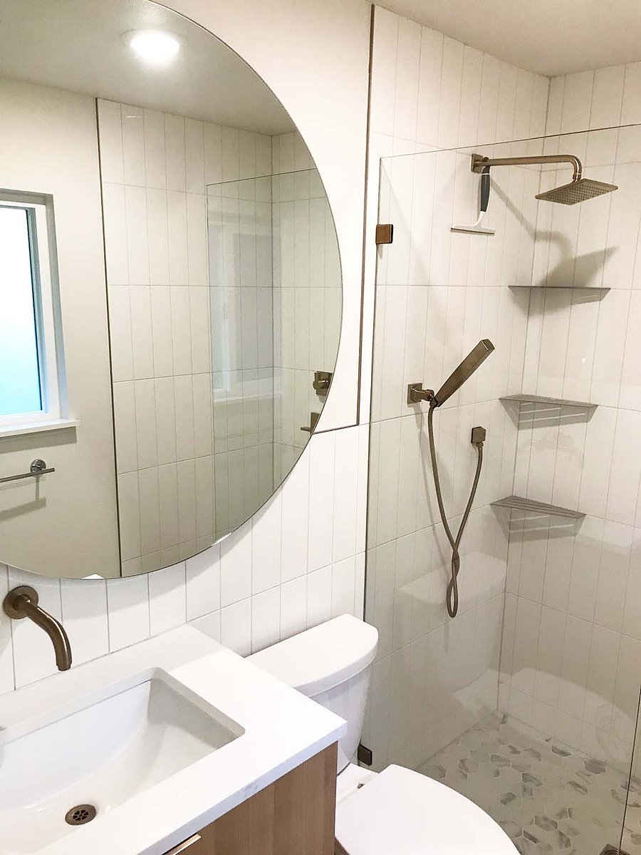 Bathroom 1: located off Bedroom 1, with shower and heated floors