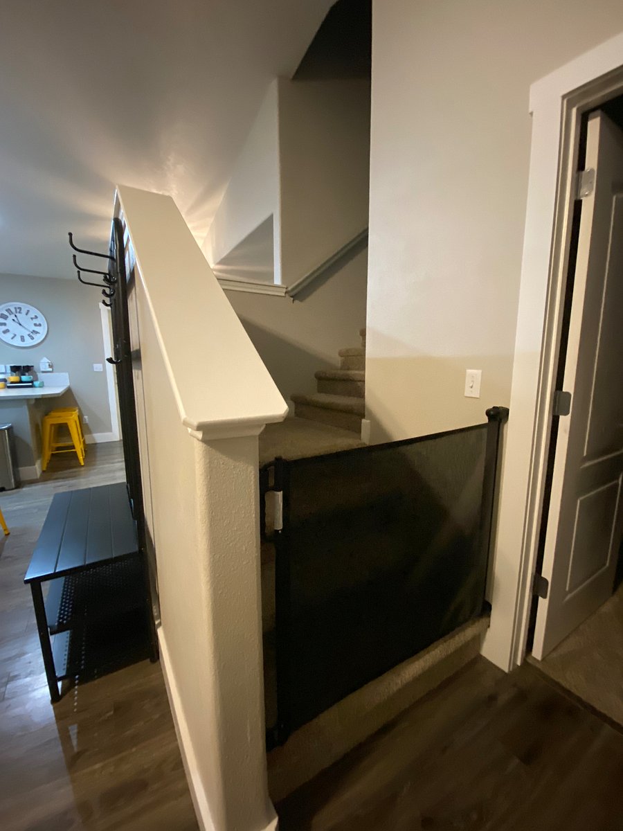 Baby gate can be moved to top or bottom of stairs.