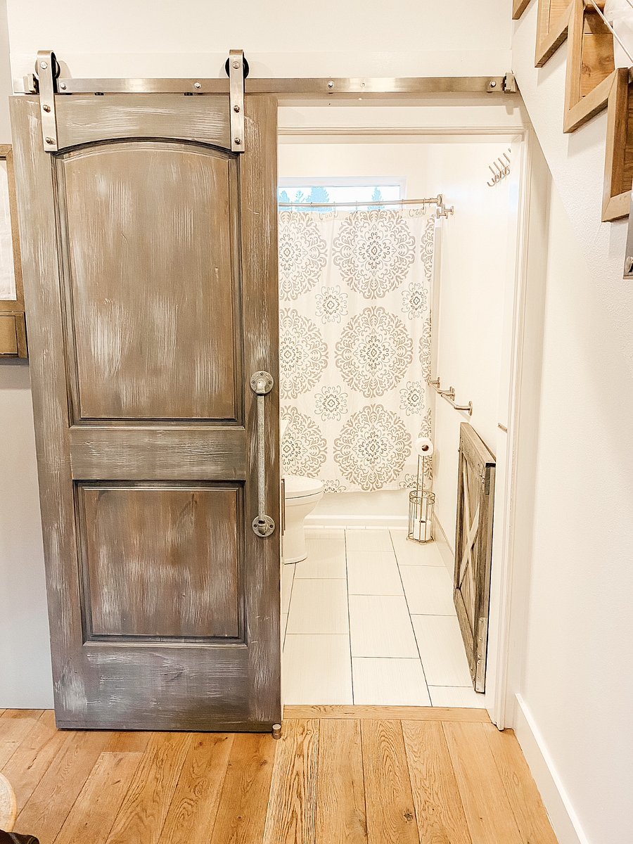 main floor bathroom with tub shower combo