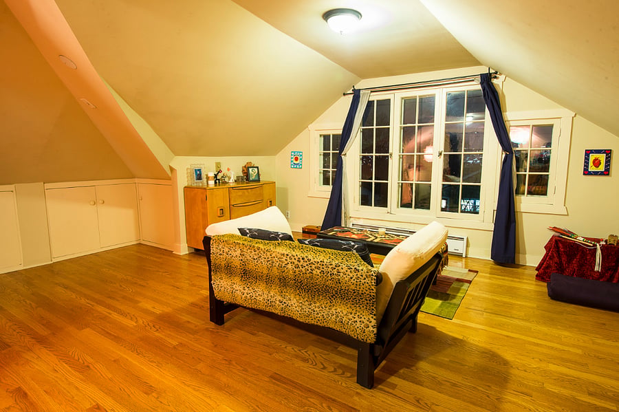 Upstairs master suite includes dresser and cabinets