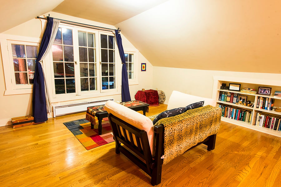 Large upstairs masters suite with day bed futon, coffee table and a full view of the downtown Seattle skyline.