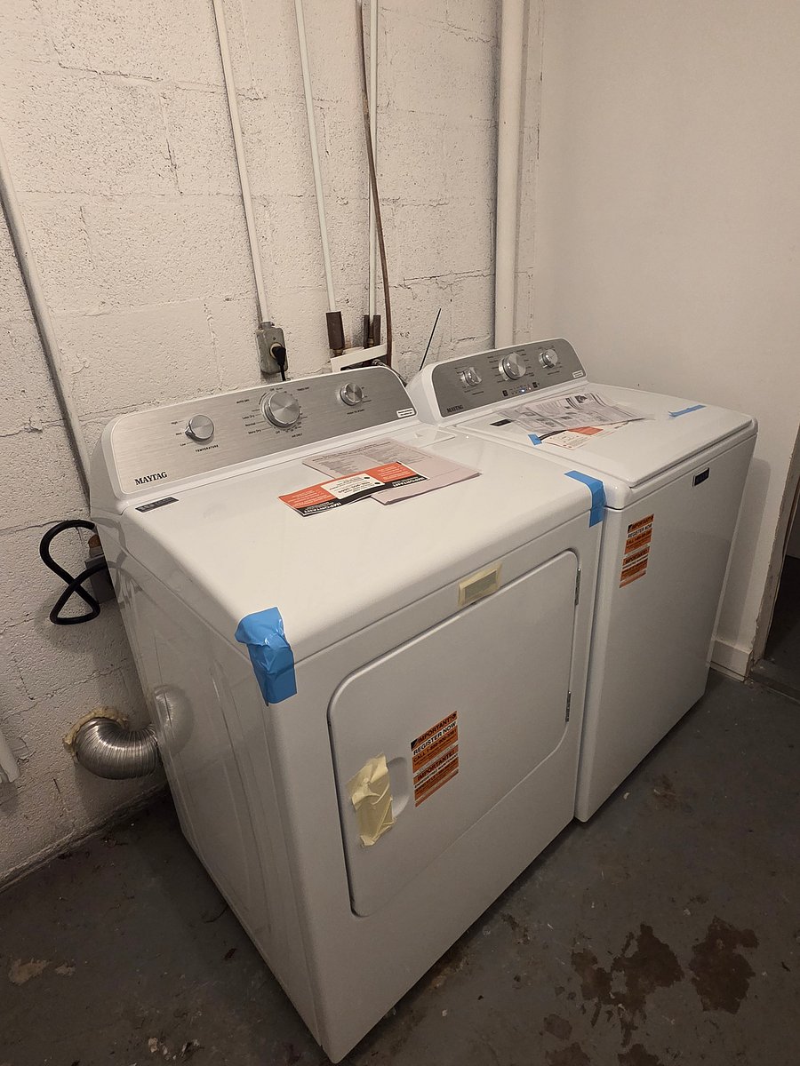 Washer and dryer located in basement. 