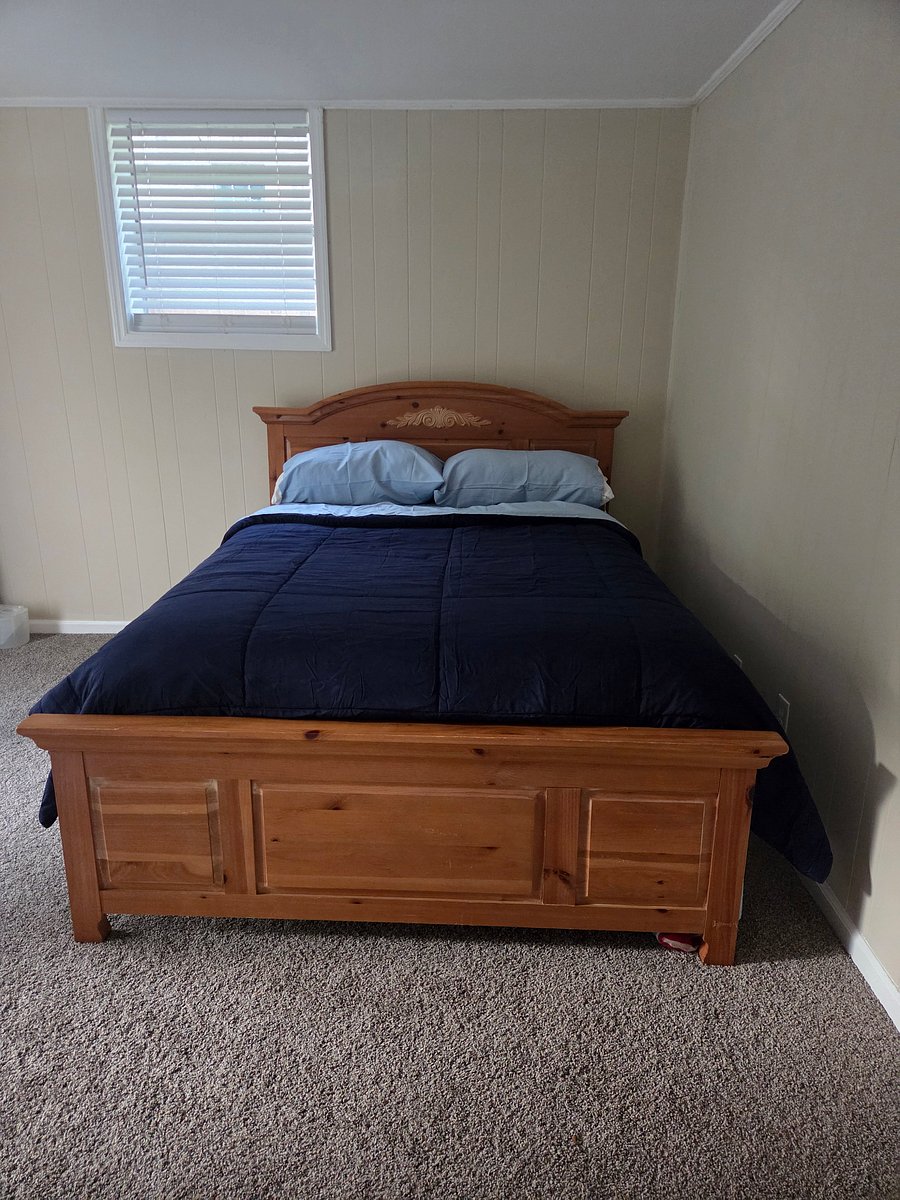 Queen sized bed in private basement area. 