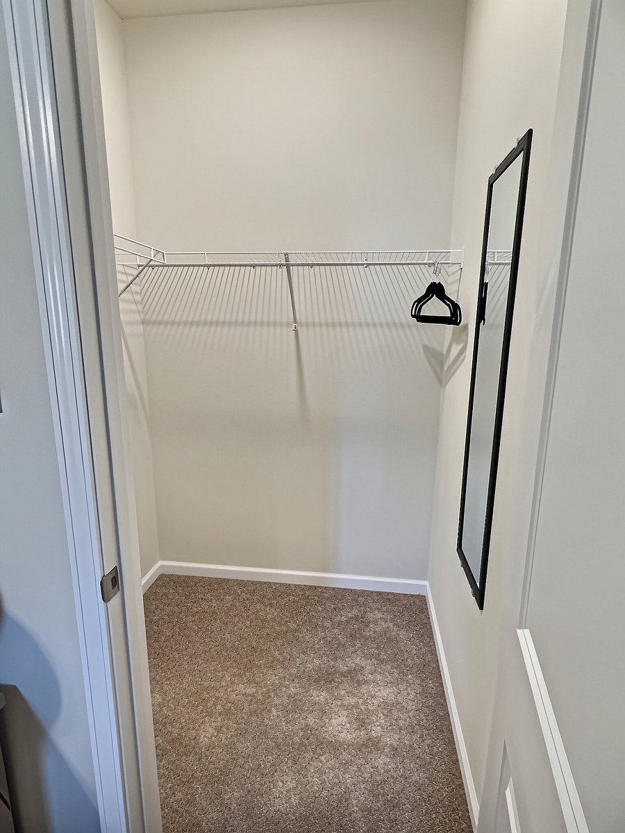 Bedroom 1: walk-in closet