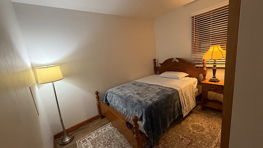 Bedroom with new floors, new closet, and freshly painted