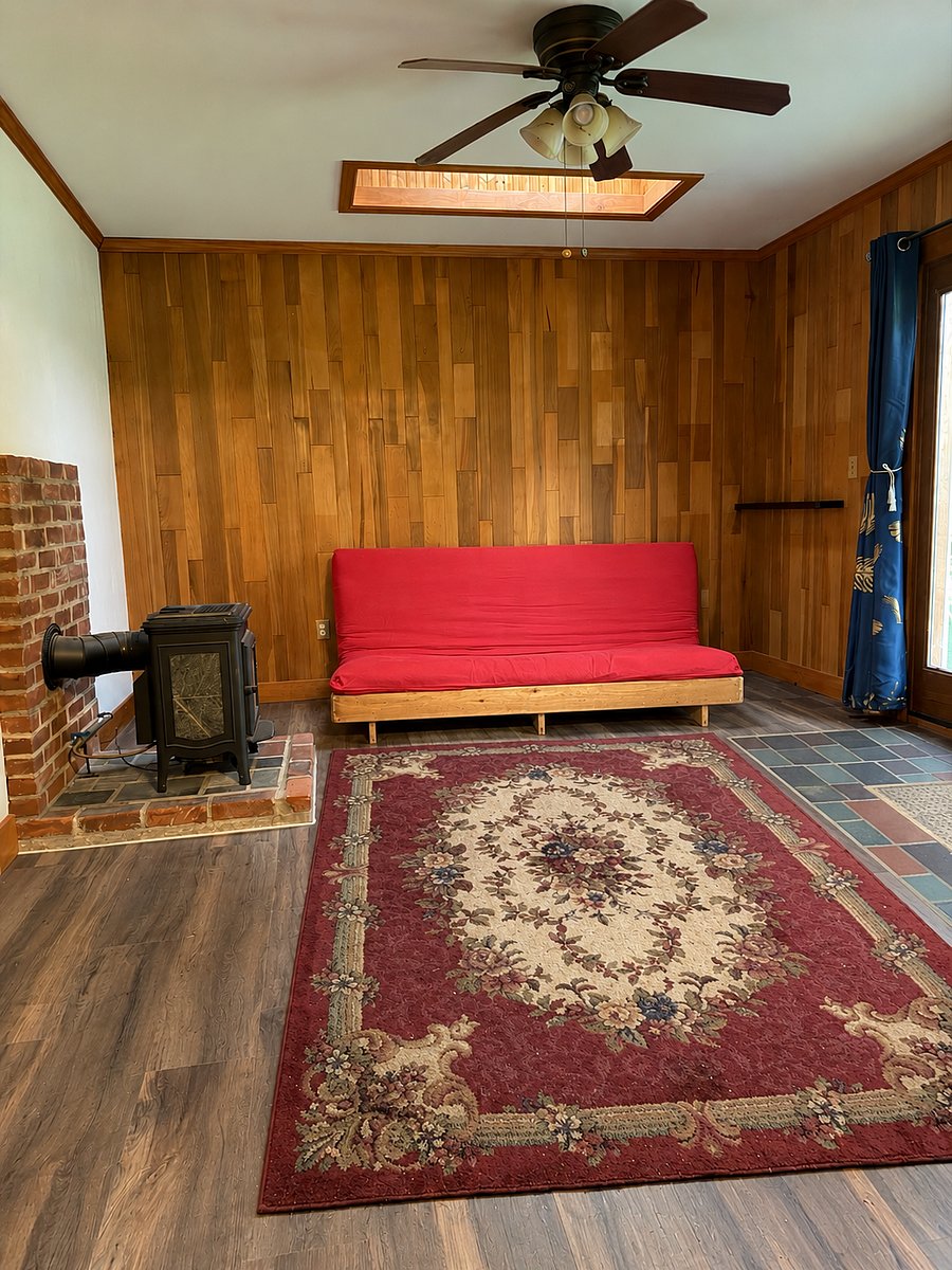 Dedicated living room space with its own fireplace and private entrance.