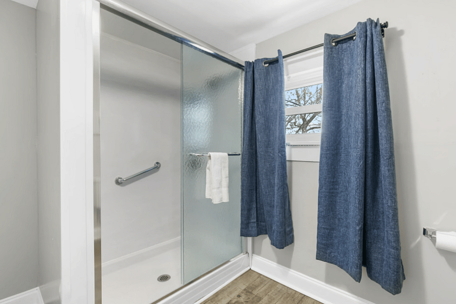 Located on the main floor, this full bathroom includes a stand-up shower and provides quick access from the living areas and king bedroom.