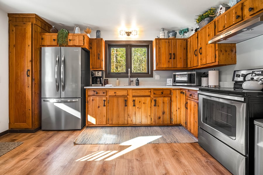 Fully stocked kitchen w/ Custom cabinets.