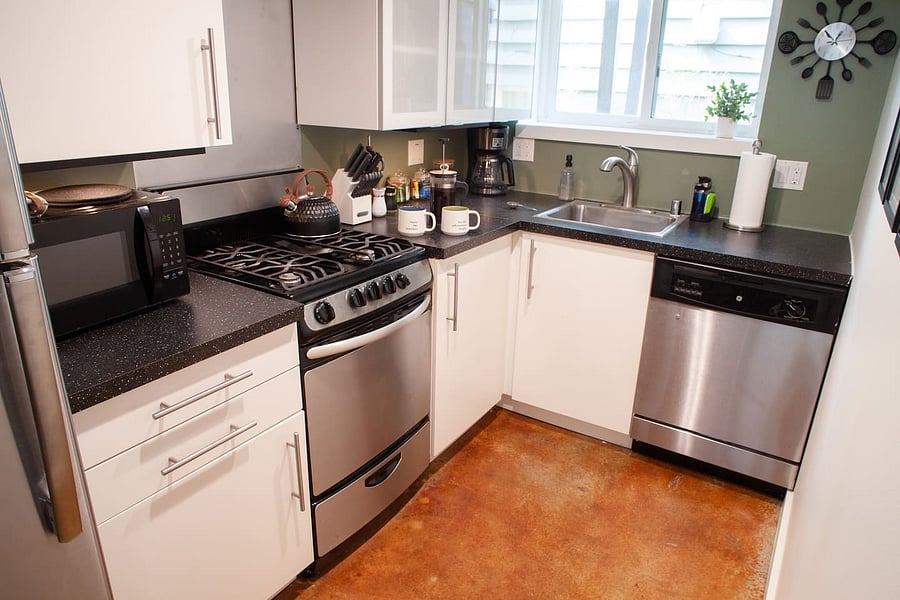 Fully equipped kitchen for cooking meals.