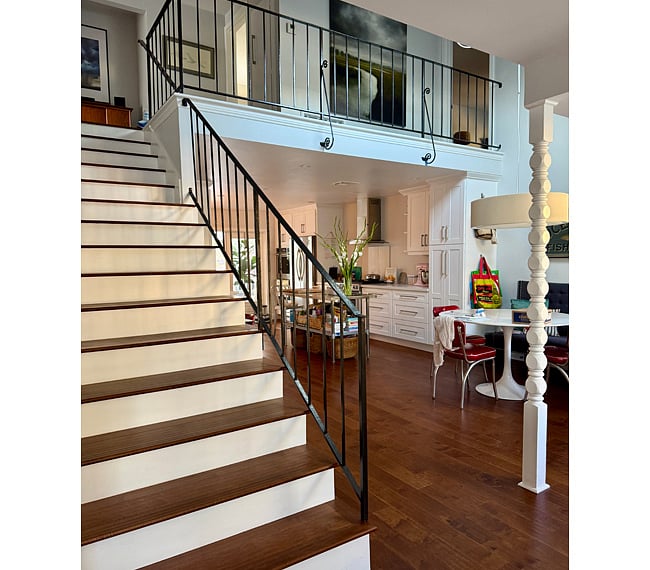Staircase at main entry leads up to your private suite sanctuary
