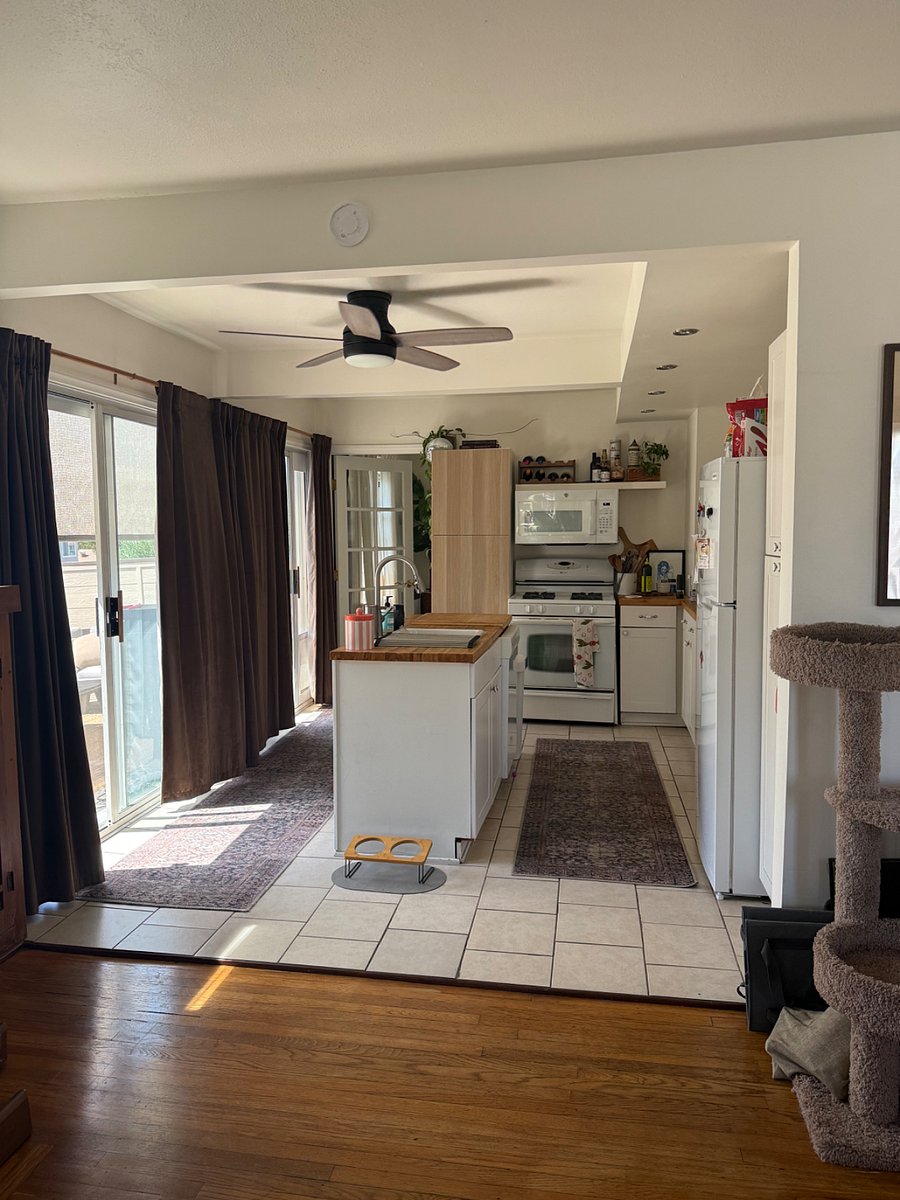Kitchen. Outdoor deck is off the kitchen. Your room is also off the kitchen